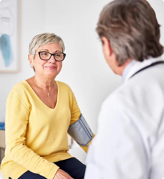 A female patient meets with her practitioner